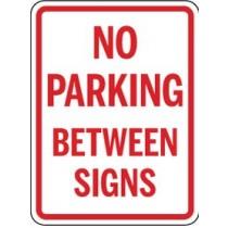 No parking between signs sign with red text on a white background