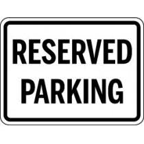 Reserved parking sign with black text on a white background