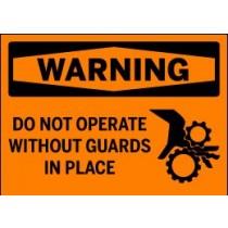 Safety warning sign with text 'WARNING: Do not operate without guards in place' on an orange background.