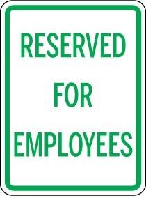 Sign with 'Reserved for Employees' text on a white background