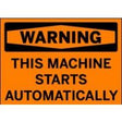 Orange warning sign with black text 'WARNING: This machine starts automatically' on a white background