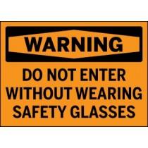 Warning sign with text 'DO NOT ENTER WITHOUT WEARING SAFETY GLASSES' on a black background