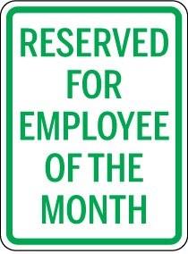 Sign with text 'Reserved for Employee of the Month' on a white background