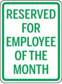 Sign with text 'Reserved for Employee of the Month' on a white background
