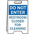 Sign with 'Do Not Enter Restroom Closed for Cleaning' text on a white background