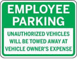 Green sign with 'Employee Parking' text and warning about unauthorized vehicles.