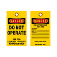 Two yellow safety tags with black text on a white background