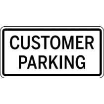 Sign with 'CUSTOMER PARKING' text on a white background