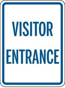 Visitor Entrance sign with blue text on a white background