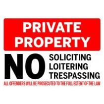 Warning sign for private property with soliciting, loitering, and trespassing restrictions.