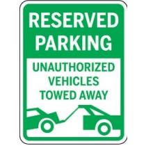 Reserved parking sign with text and a tow truck icon on a white background