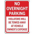 No overnight parking sign with text about towing fees.