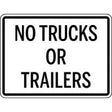 No Trucks or Trailers sign with black text on a white background