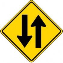 Yellow traffic sign with black arrows indicating a merge.