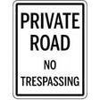 Sign with 'Private Road No Trespassing' text on a white background