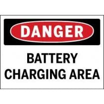 Danger sign indicating a battery charging area with red, black, and white colors.