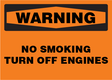 Warning sign with 'No Smoking' and 'Turn Off Engines' text on an orange background